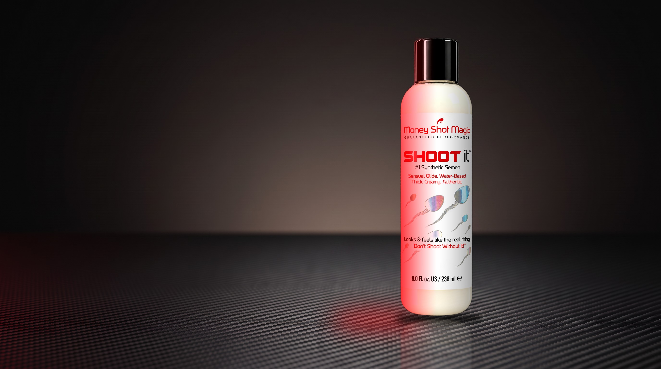 Shoot it 8 oz synthetic semen bottle on a carbon fiber studio surface